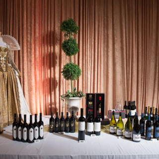 Organized variety of wine bottles at 2016 Bacchanalia Gala