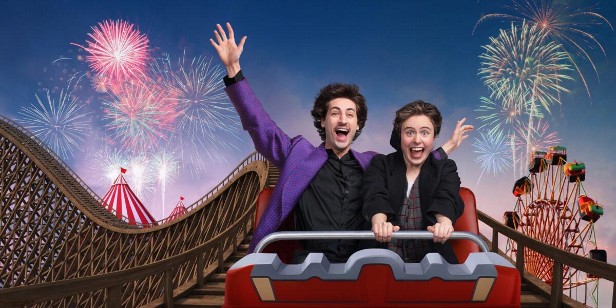 Orsino and Viola in a rollercoaster car with excited faces
