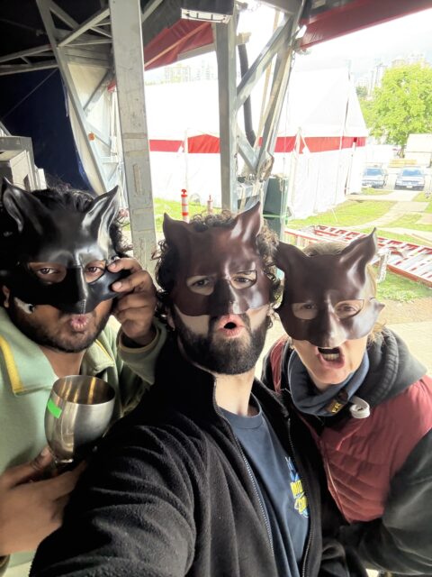 A selfie of Karthik Kadam, Tanner Zerr, and Kristi Hansen wearing masquerade masks.