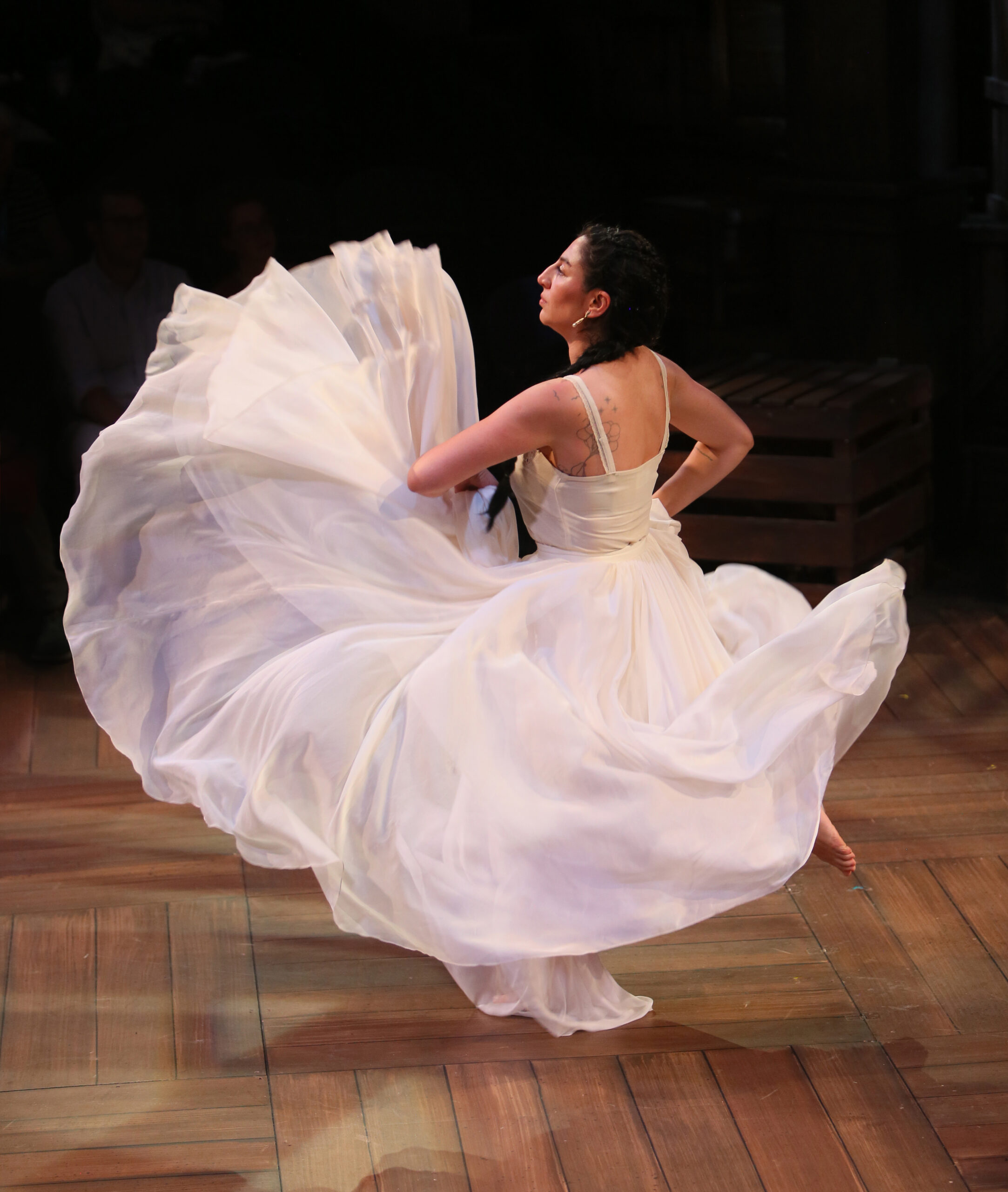 Emilia dancing and her skirt swirls