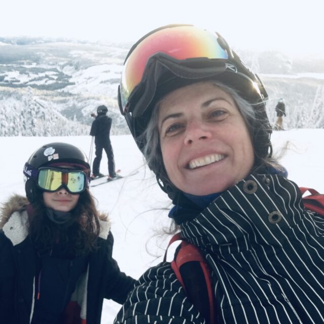 A selfie with Jessica and her children on a ski hill.